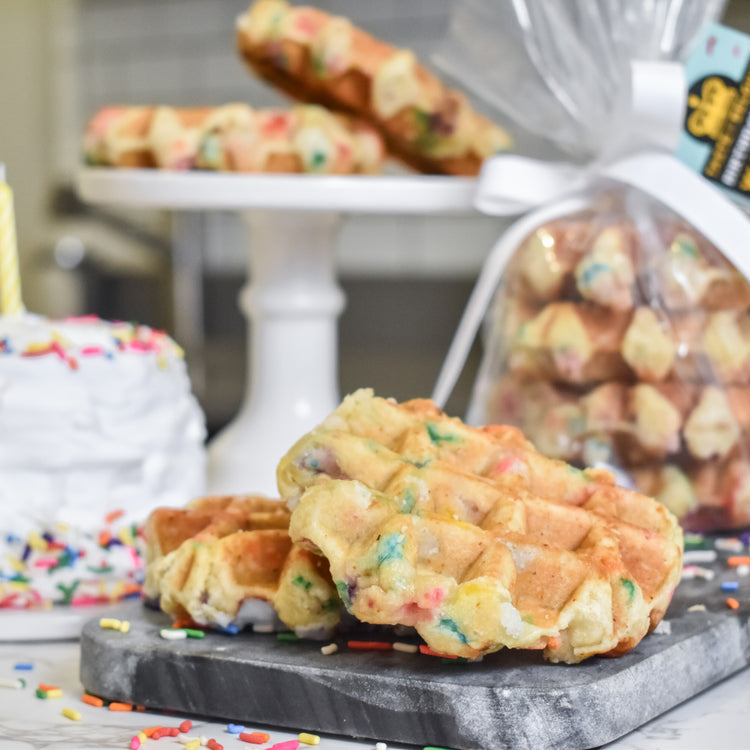 A pack of birthday cake-flavored Liège waffles with colorful sprinkles.